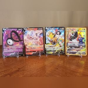 Pokemon cards- Reshiram V, Unown V, Passimian, Zeraora V